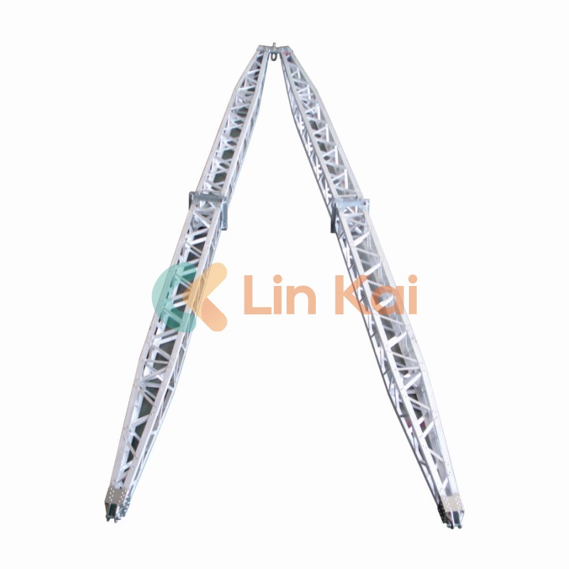 How can a gin pole improve work site productivity during tower erection?